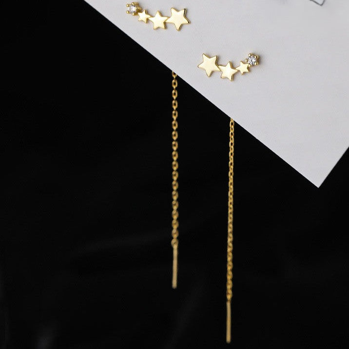 boucle d'oreille quatre étoile dorée