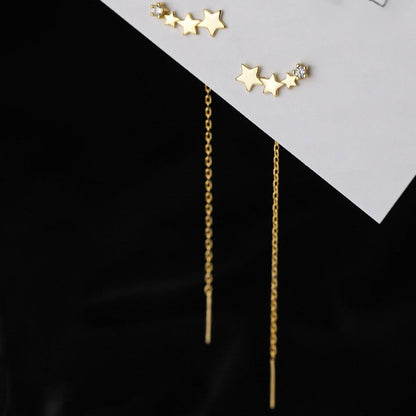 boucle d'oreille quatre étoile dorée