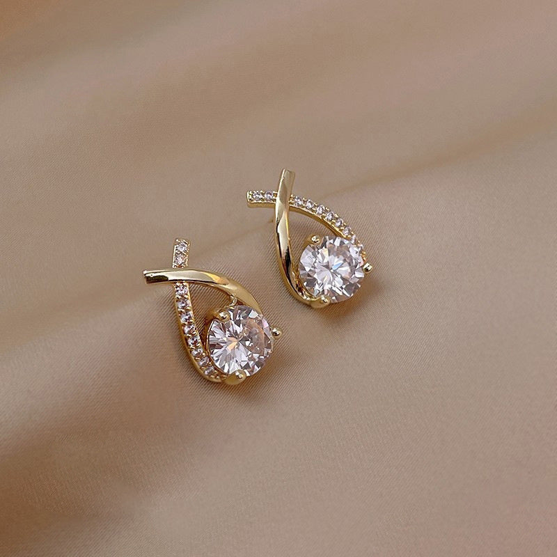Boucles d'oreilles fantaisie Ravelys dorées paire regroupée