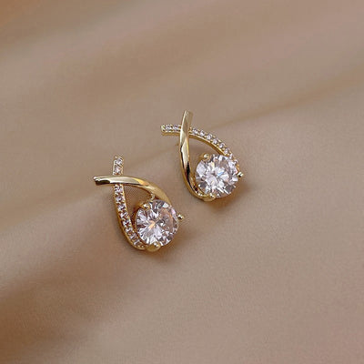 Boucles d'oreilles fantaisie Ravelys dorées paire regroupée