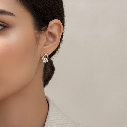 Boucles d'oreilles fantaisie Ravelys dorées vue oreille gauche