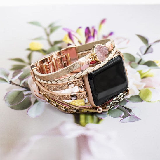 bracelet montre Harmelia or rose sur fond de fleur
