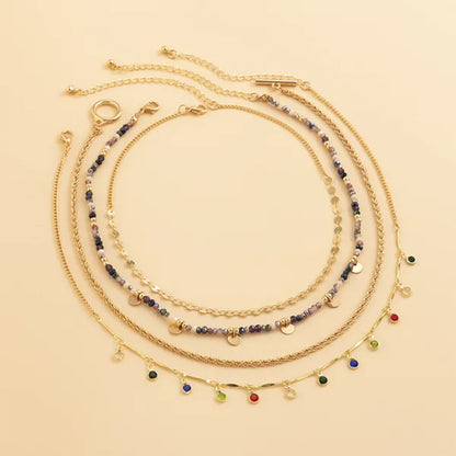 collier multicouche Niméra déposé en cercle